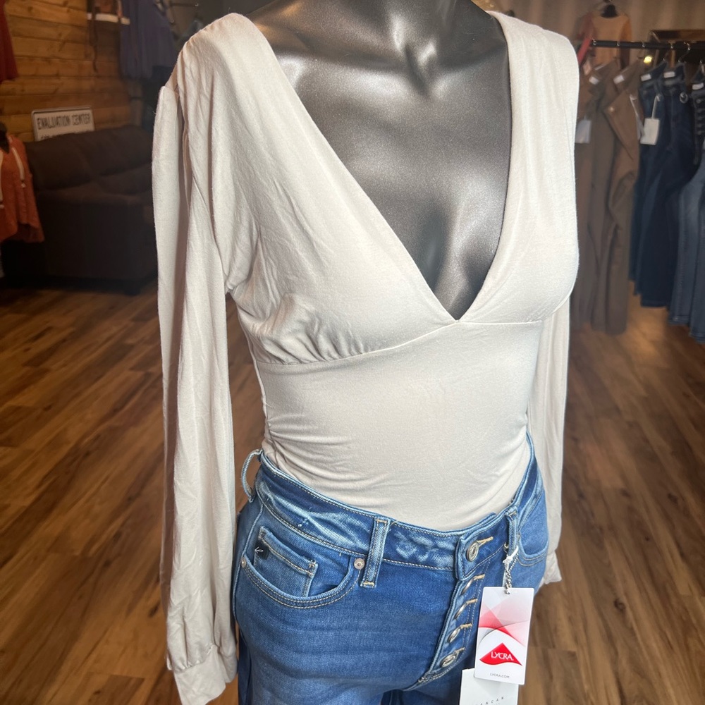 Neutral long sleeve bodysuit